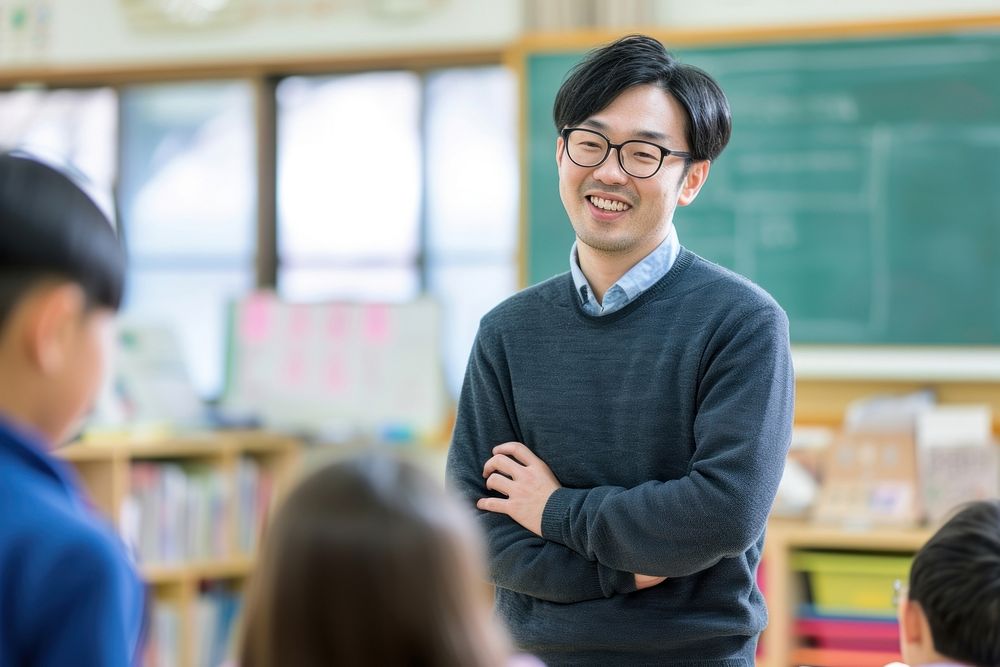 Japan teacher teaching a classroom of students adult intelligence togetherness.