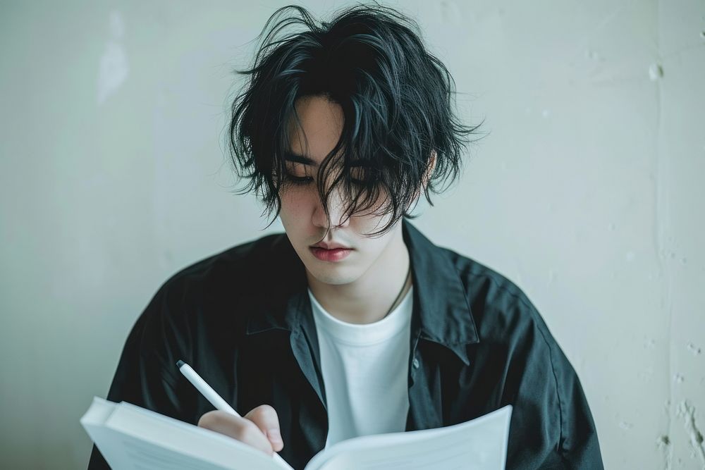 Japanese writer working contemplation hairstyle portrait.