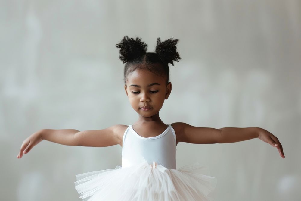 Photo of little black girl ballet dancing child copy space.