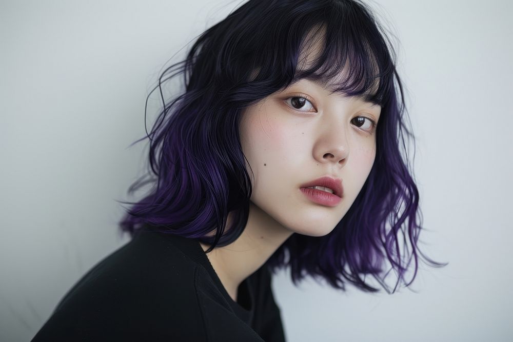 American young woman with vivid purple black hair portrait photography fashion.