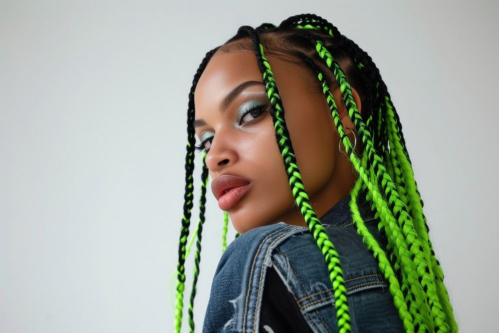 European young woman with vivid green black braids hair portrait fashion dreadlocks.