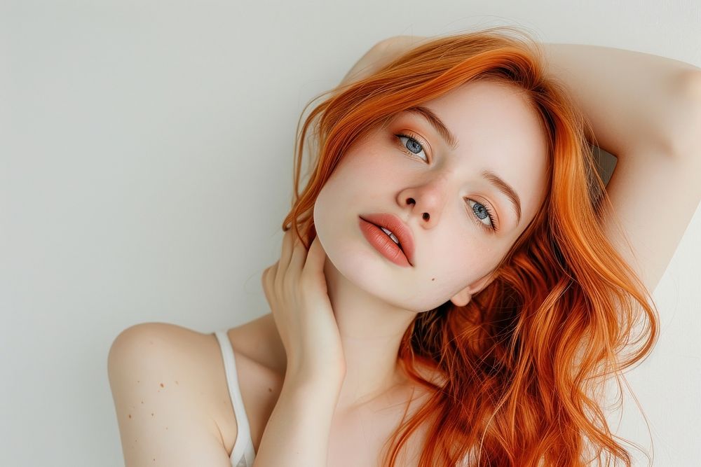 European young woman with orange hime long hair portrait skin photography.