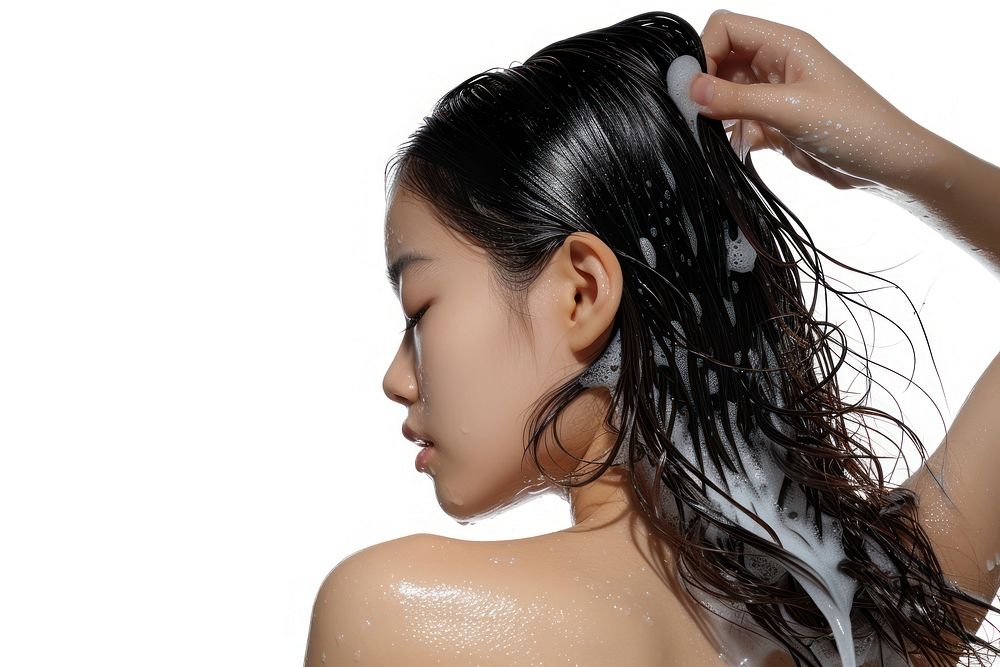 Korean woman washing hair with shampoo portrait bathing fashion.