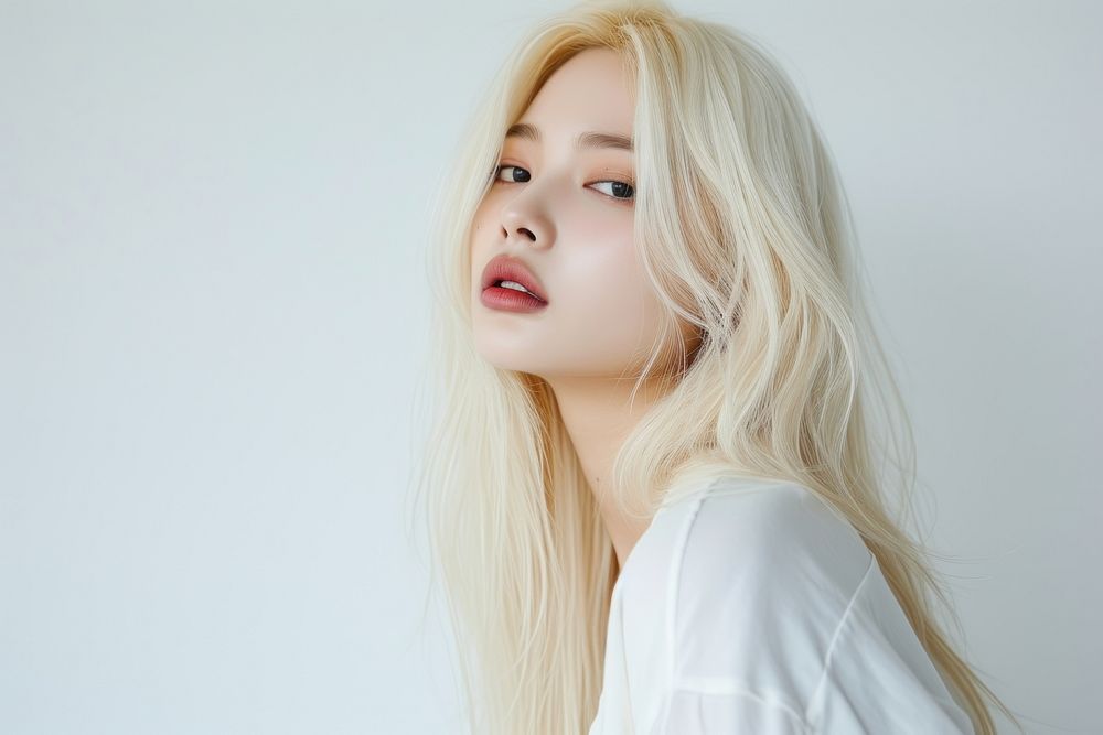Korean young woman with light blonde long wolf cut hair portrait photography fashion.