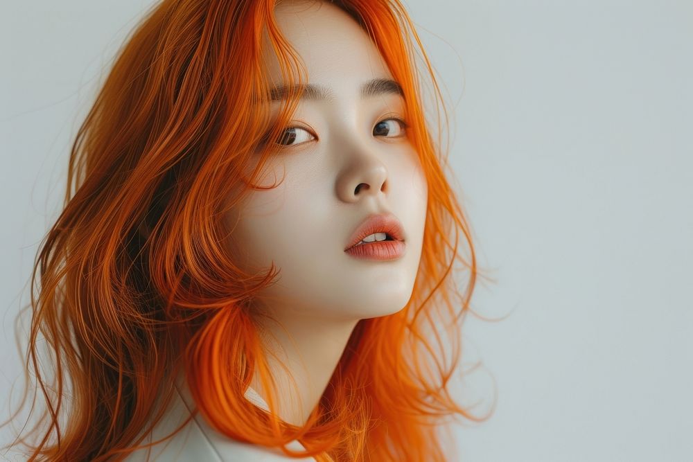 Korean young woman with orange long wolf cut hair portrait photography fashion.