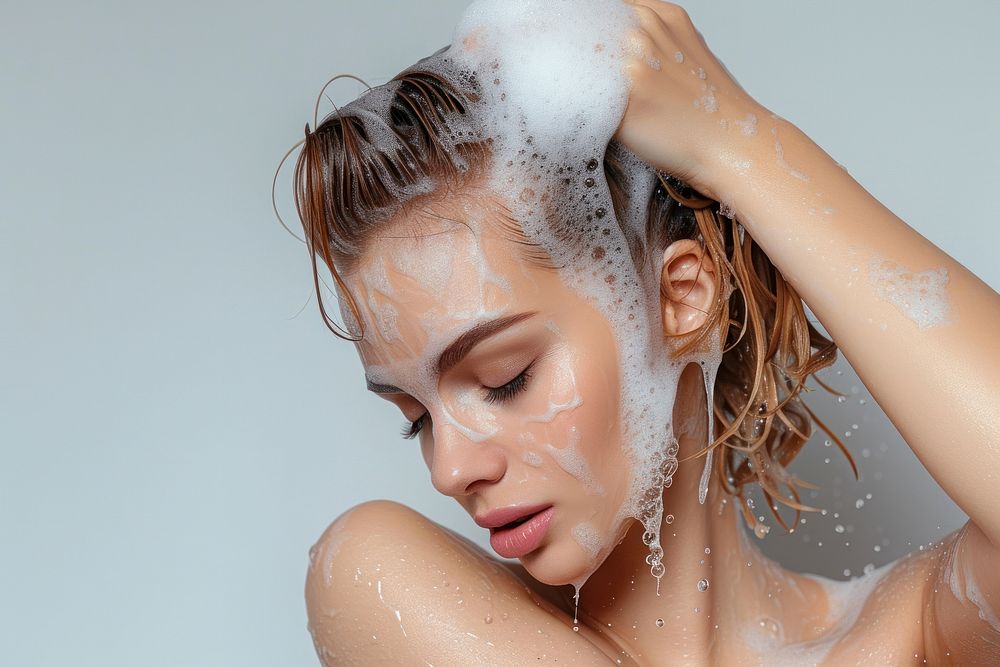 Woman washing hair portrait bathing adult.