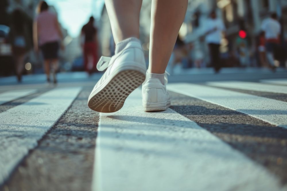 Person walking crossing footwear adult.