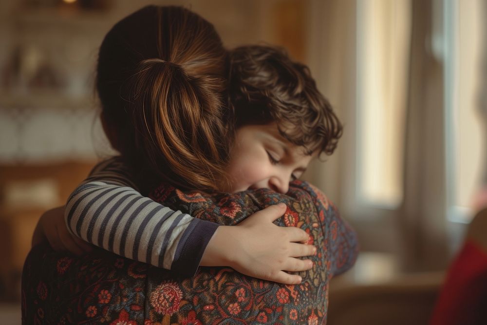 Middle Eastern boy hugging his mom love togetherness affectionate.