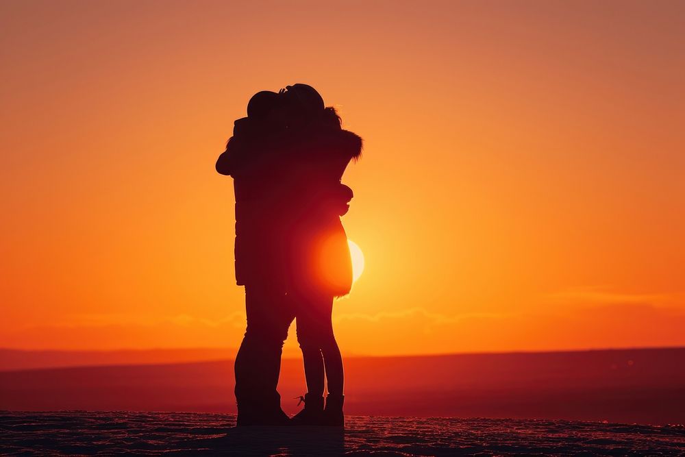 Silhouette Middle Eastern hugging backlighting sunset adult.