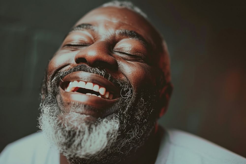 Black man laughing adult smile.