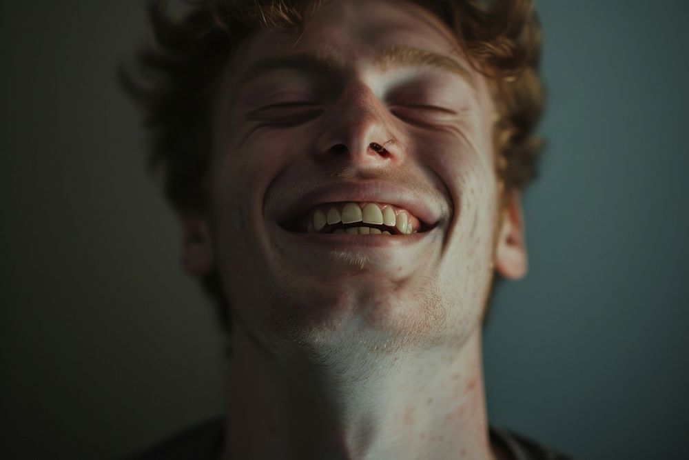 British man laughing adult smile.