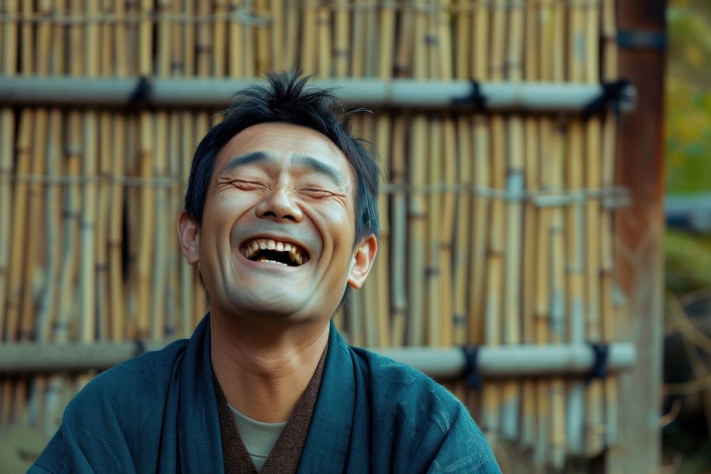 Japanese man laughing spirituality architecture.
