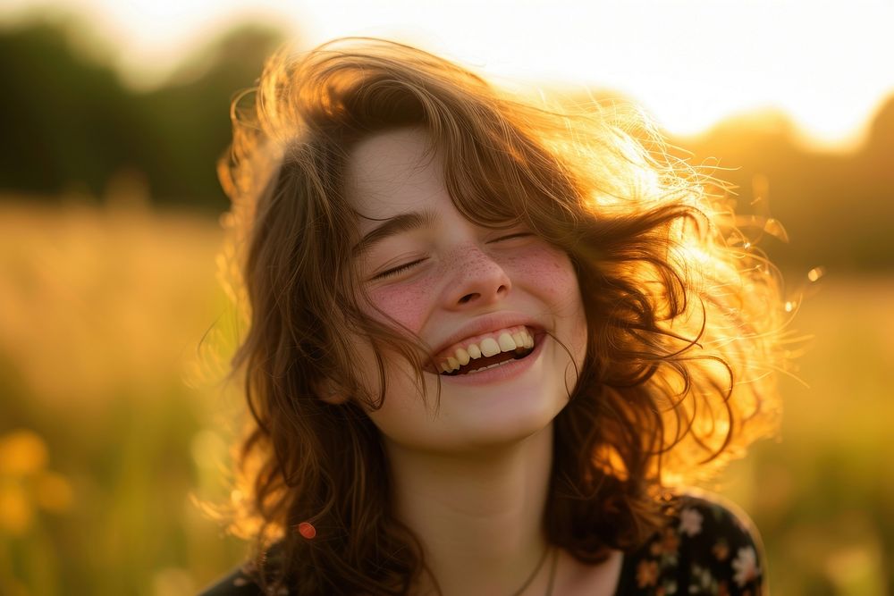 Young british girl laughing smile eyes closed.