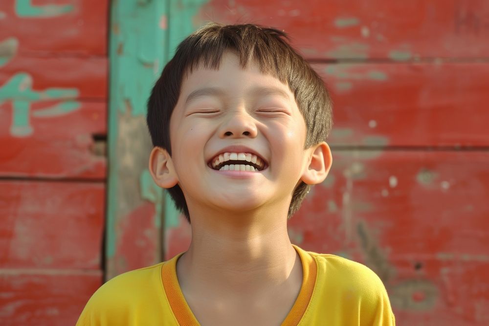 Young korean boy laughing smile child.