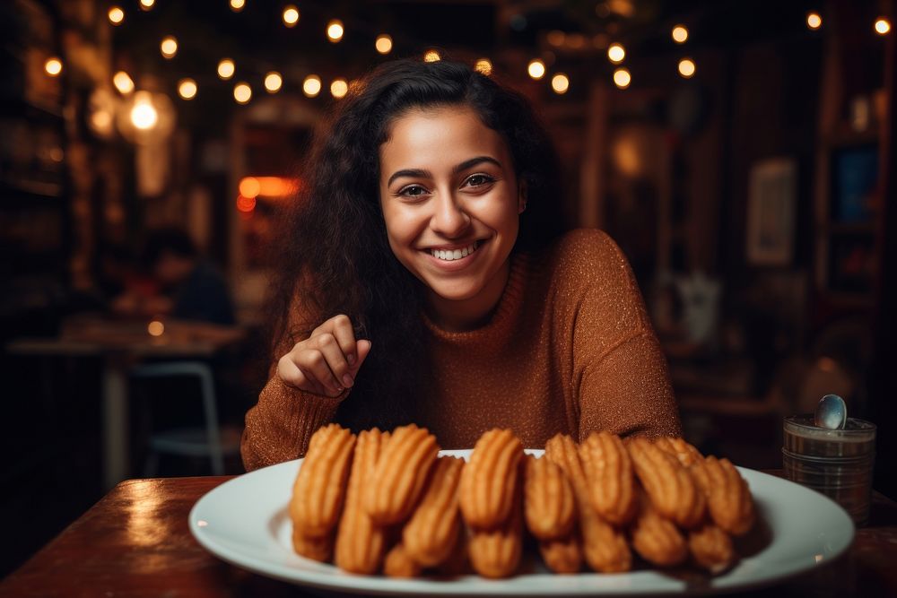 Girl eating churros food dessert smile.