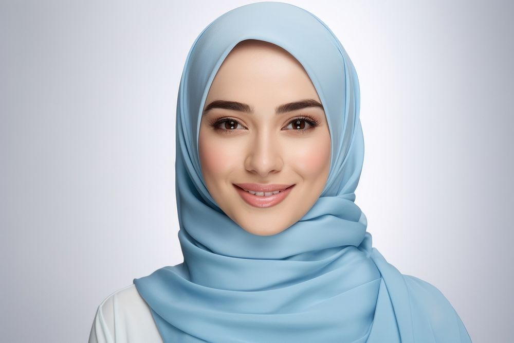 Malaysian woman scarf smile blue.
