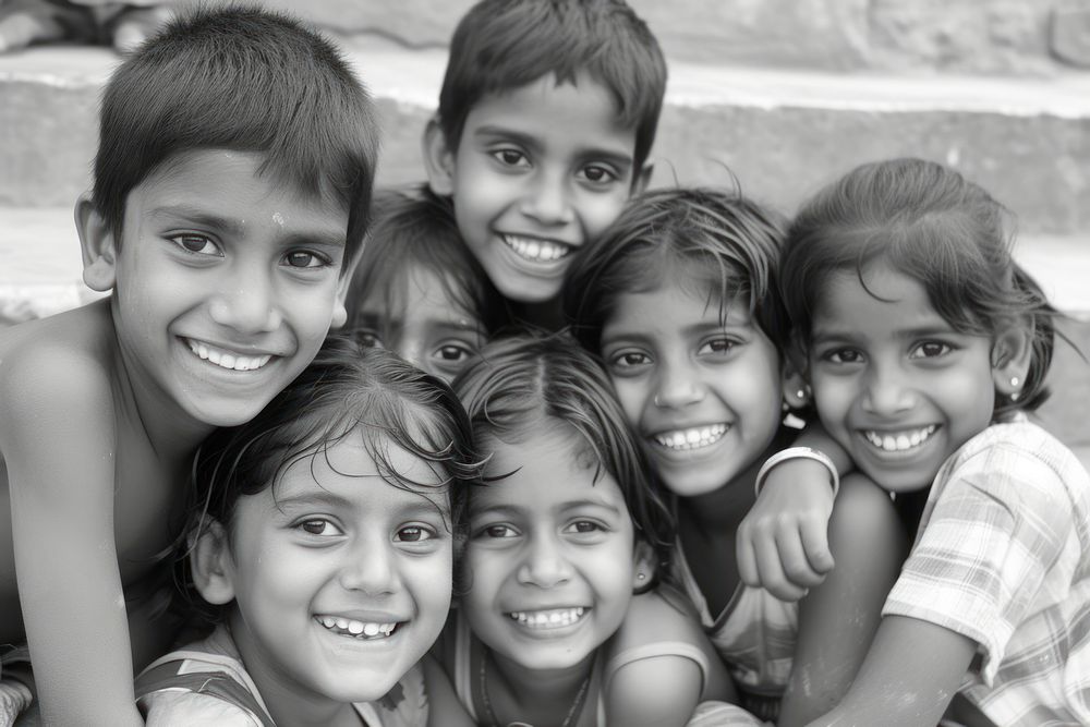 Underprivileged children in human rights laughing portrait teeth.