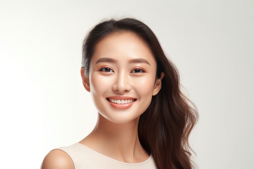 A young Filipino woman with cosmetic product adult smile happy.