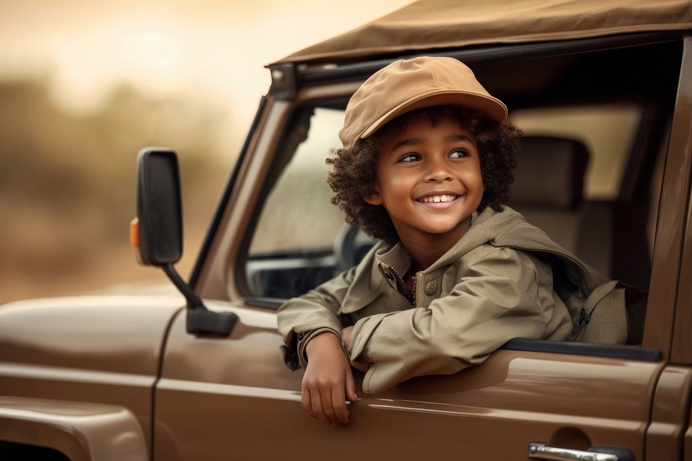 Kid at safari vehicle smile child.