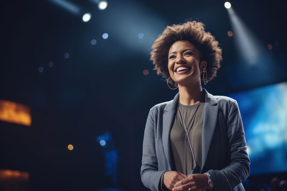 Black woman speaker on professional stage smiling smile adult.
