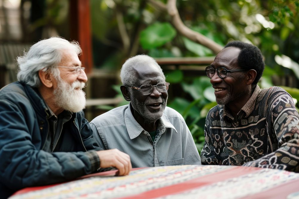 Diversity old men talk together laughing adult togetherness.