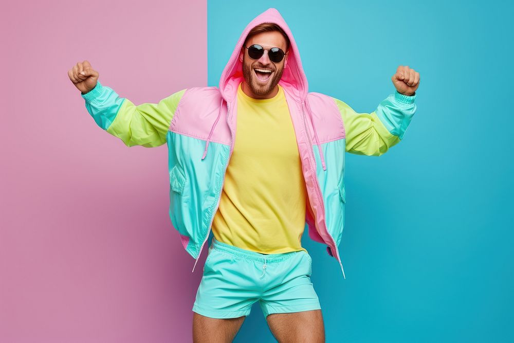 Cool LGBT young Latin man with fashionable clothing style full body on colored background sweatshirt fun excitement.