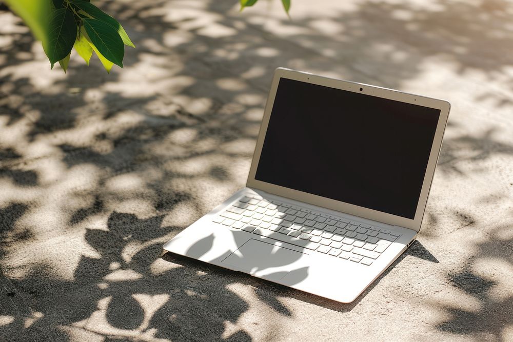Laptop  computer shadow portability.