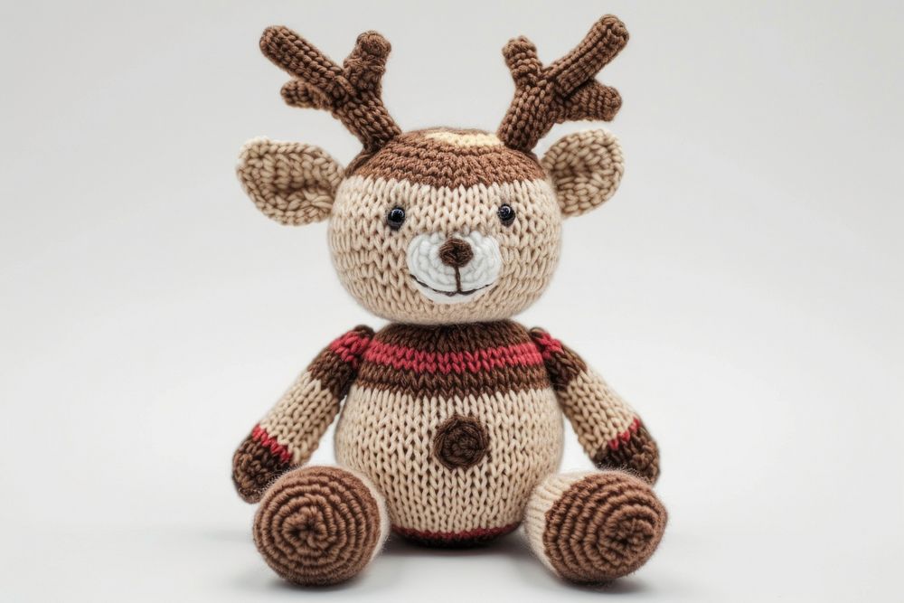 Reindeer toy knitted plush.