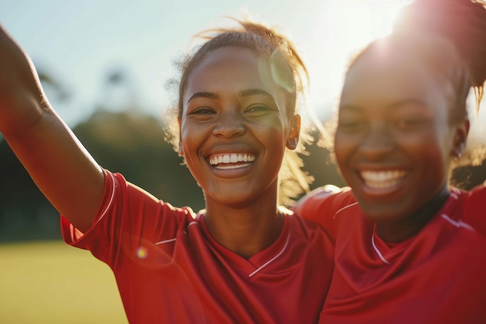 African american female soccer players laughing smile day.