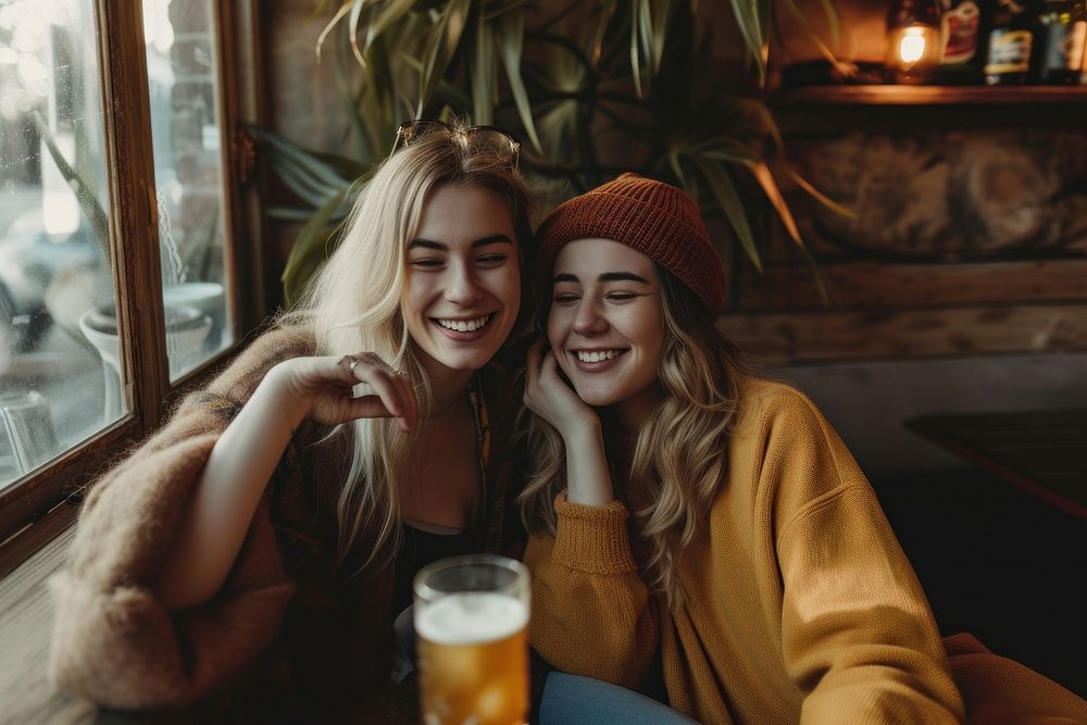 Two friends hanging out together photography laughing portrait.