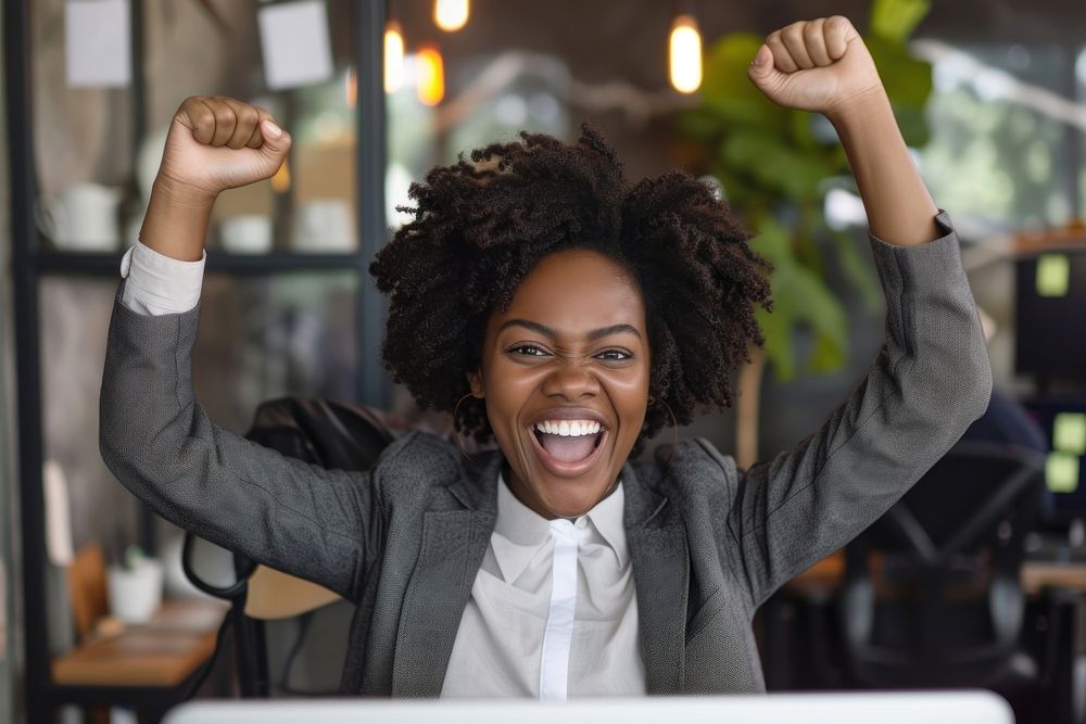 African american businesswoman cheering smile achievement.