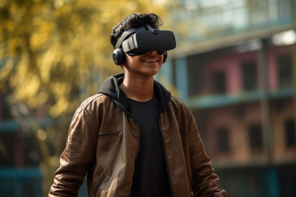Indian teenager wearing vr glasses photo architecture photography.
