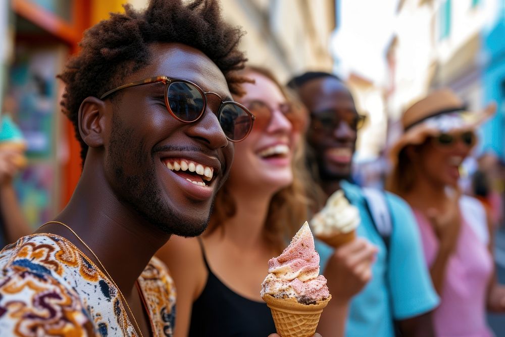 Multiethnic tourists having fun while eating an ice cream outdoors laughing glasses adult.