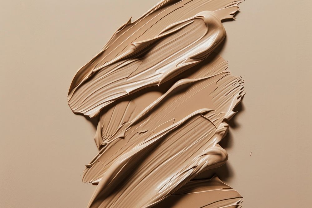 Cosmetic foundation smears cream pattern dessert.