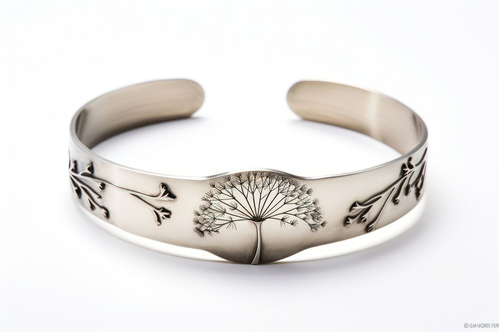 Engraved dandelion bracelet jewelry white background accessories.