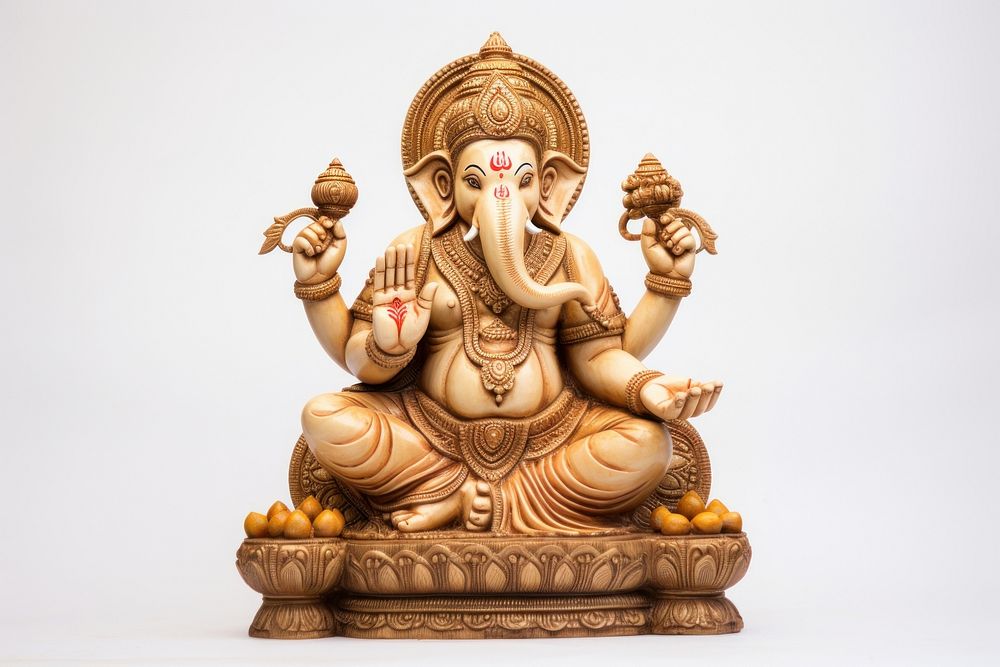 Ganesha statue representation spirituality cross-legged.