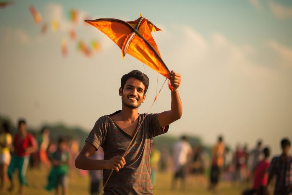 Bangladeshi young mans kite festival flying.