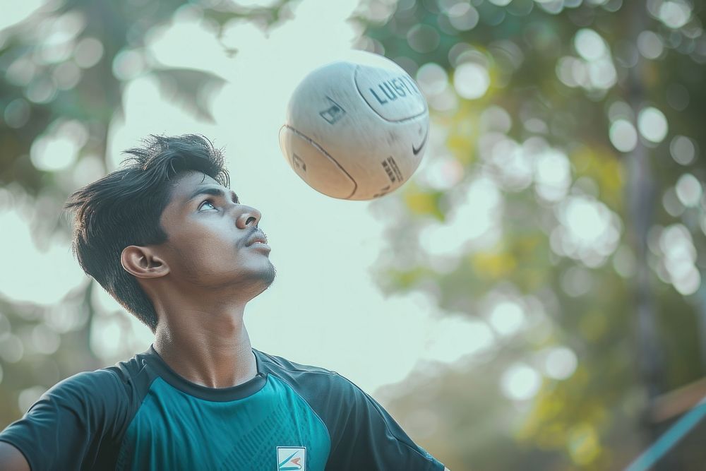 Indian young man playing sports and hobby ball day determination.