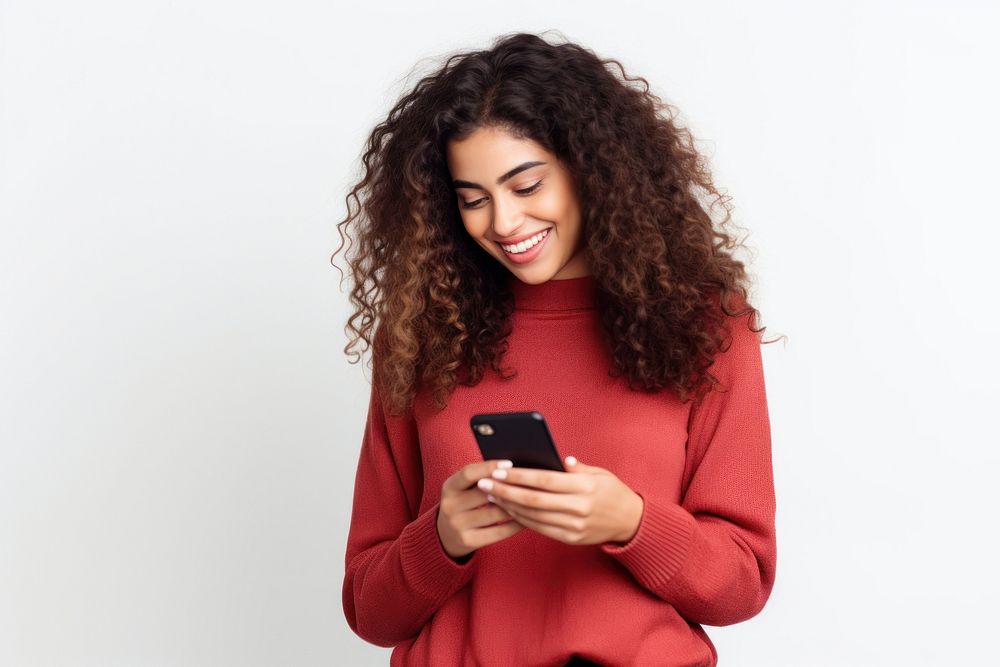 Latin woman holding mobile phone sweater smiling adult.