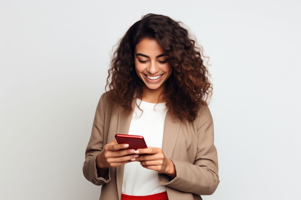 Latin woman holding mobile phone smiling smile adult.