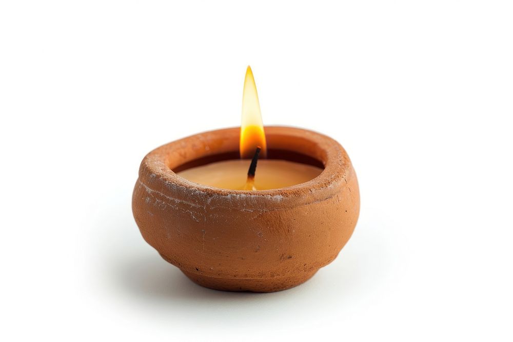 Candle made up of clay fire white background earthenware.