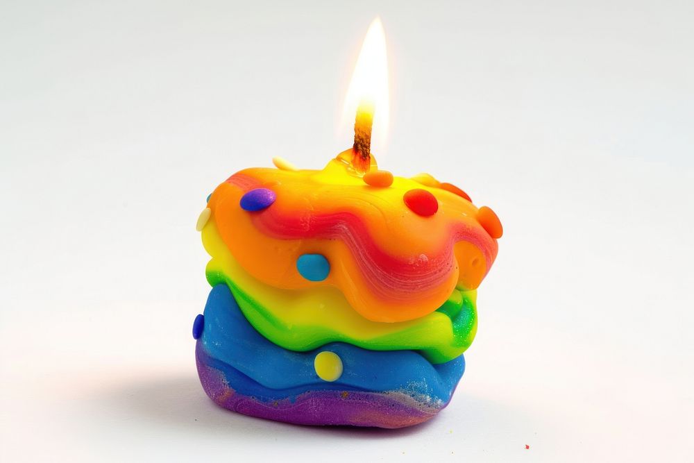 Candle made up of clay dessert cake food.