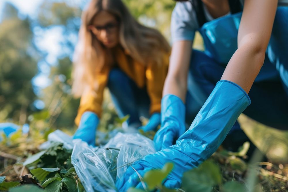 Volunteers in cleaning up nature gardening outdoors environmentalist.