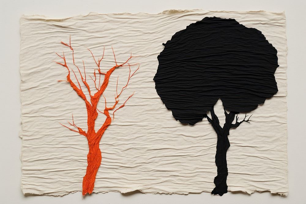 Abstract black and orange tree ripped paper art plant creativity.