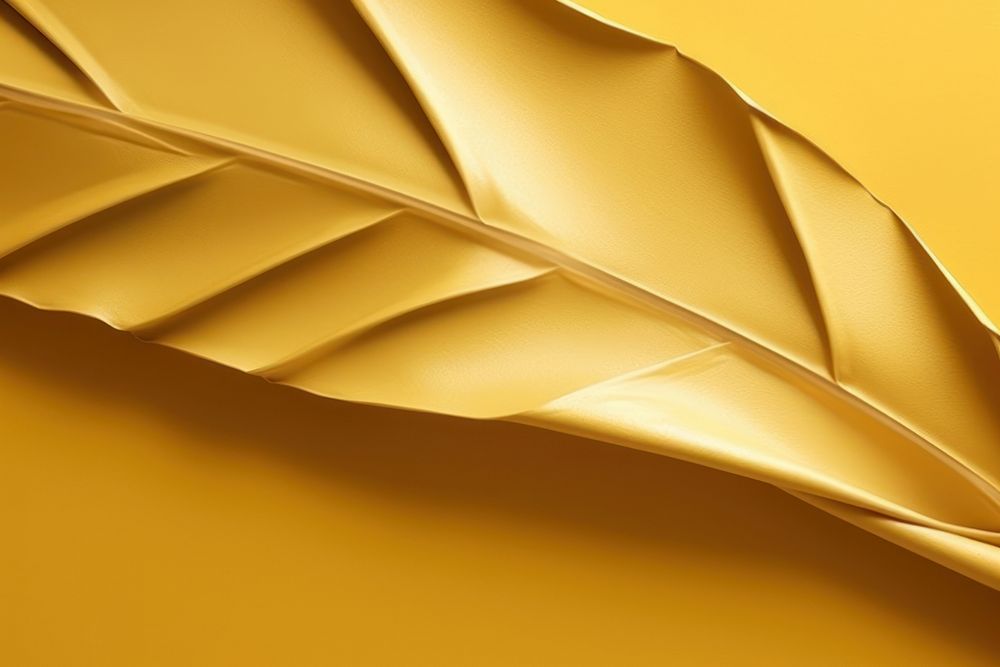 Abstract gold tropical leaf ripped paper yellow transportation backgrounds.