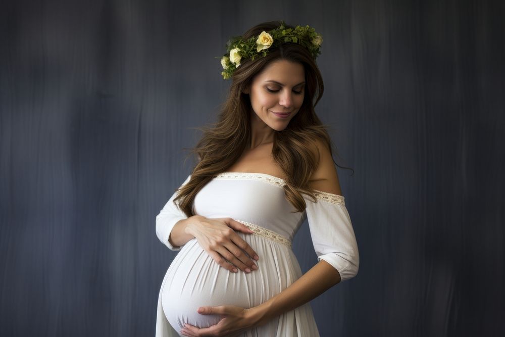 Pregnant woman dress portrait looking.