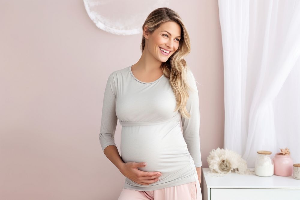 Woman fitness during pregnancy smiling sleeve adult.