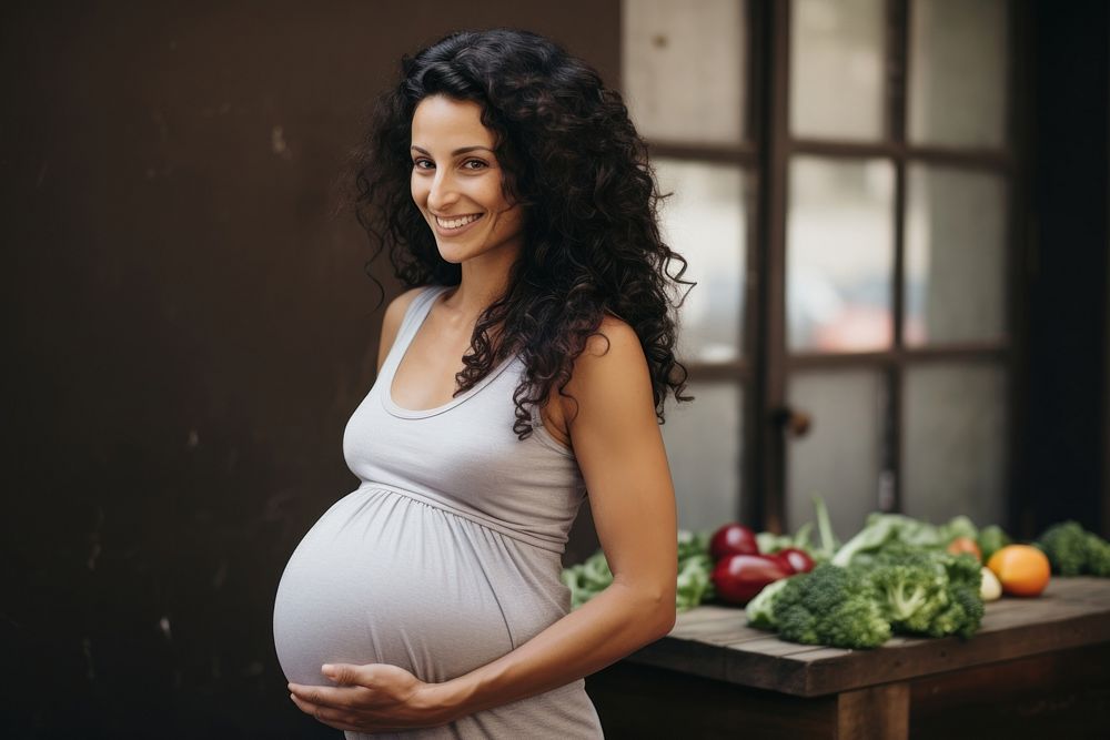 Woman fitness during pregnancy portrait smiling adult.