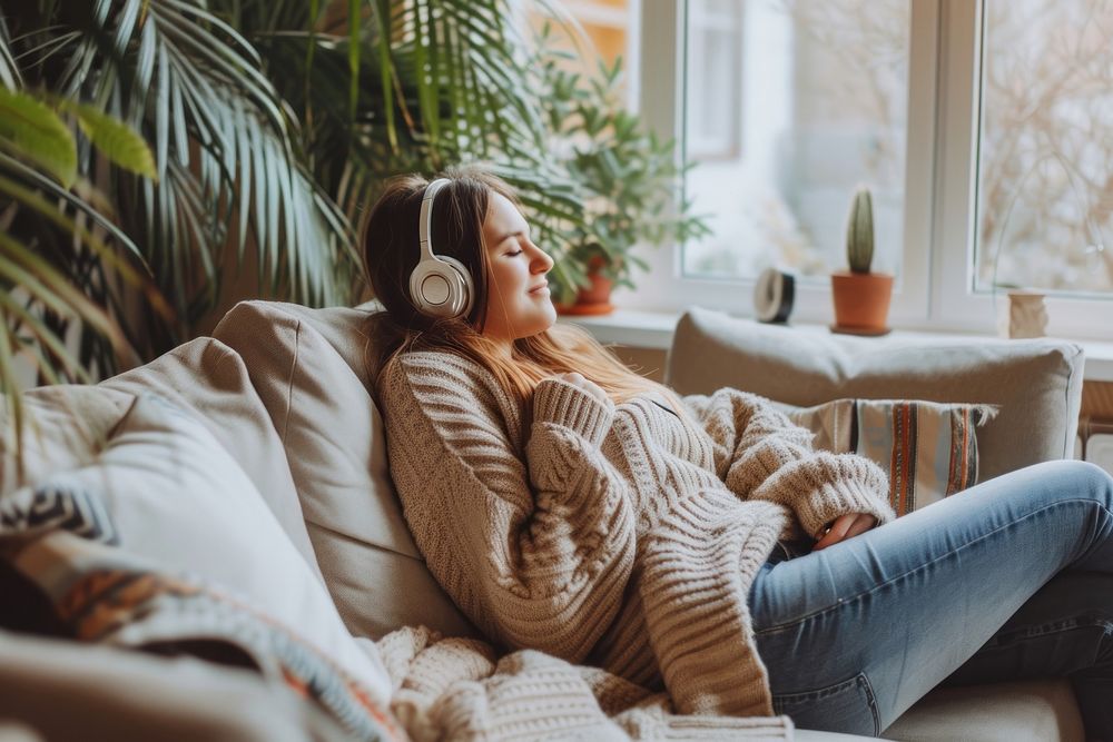 Woman listen a music headphones sweater adult.