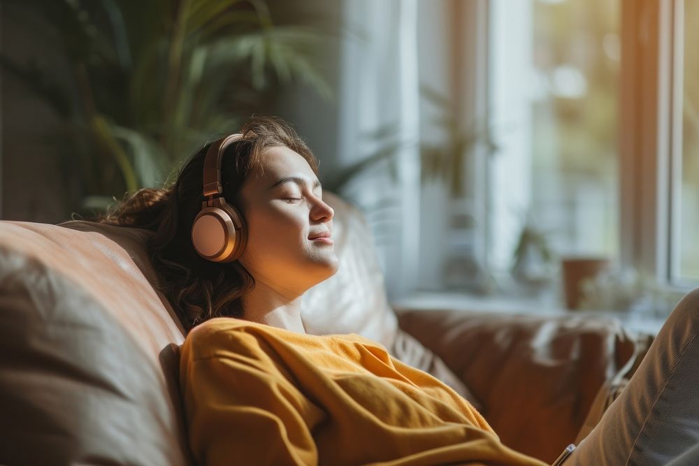 Woman listen a music headphones adult cozy.